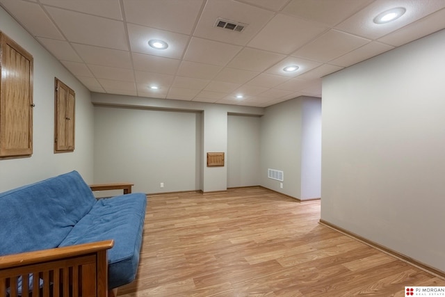 sitting room featuring light wood-style floors and baseboards