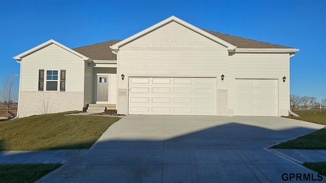 12314 S 204th Ave, Gretna, NE 68028 - ranch-style house featuring driveway, an attached garage, and a front yard