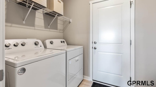 12314 S 204th Ave, Gretna, NE 68028 - laundry area with separate washer and dryer and light wood finished floors