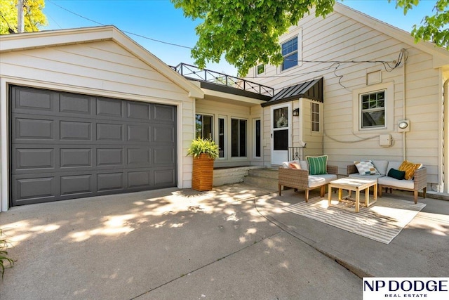 5650 Poppleton Ave, Omaha, NE 68106 - view of front of property featuring concrete driveway, a standing seam roof, an attached garage, an outdoor living space, and metal roof