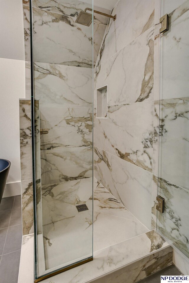 5650 Poppleton Ave, Omaha, NE 68106 - bathroom featuring a marble finish shower