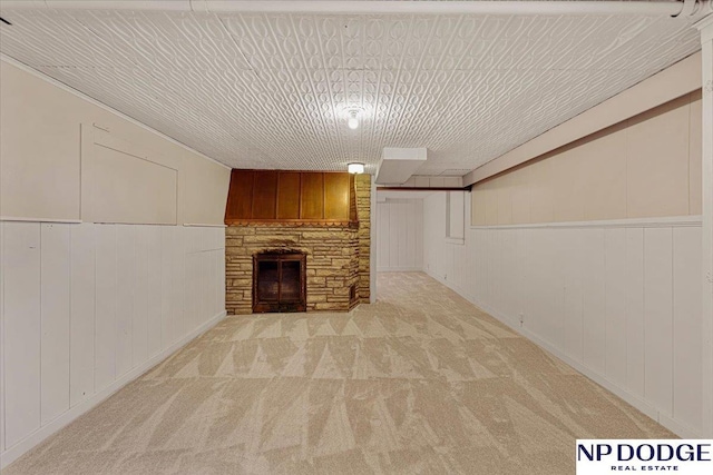5650 Poppleton Ave, Omaha, NE 68106 - unfurnished living room with a fireplace and light carpet