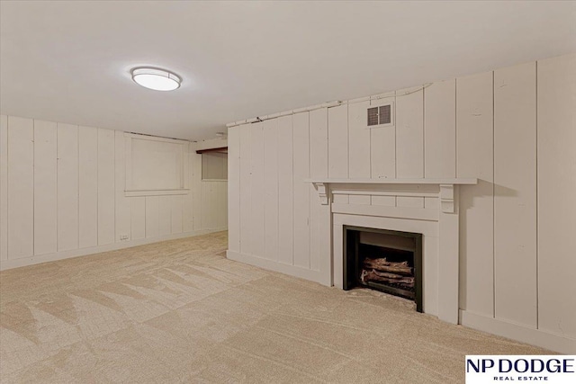 5650 Poppleton Ave, Omaha, NE 68106 - finished basement with carpet floors and a fireplace