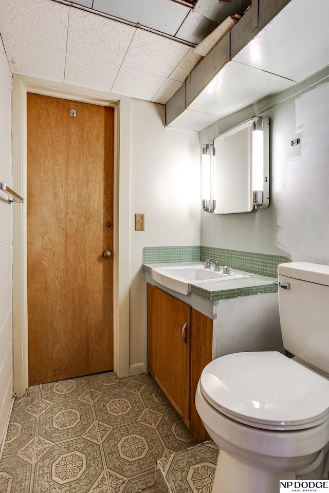 5650 Poppleton Ave, Omaha, NE 68106 - bathroom with toilet and vanity