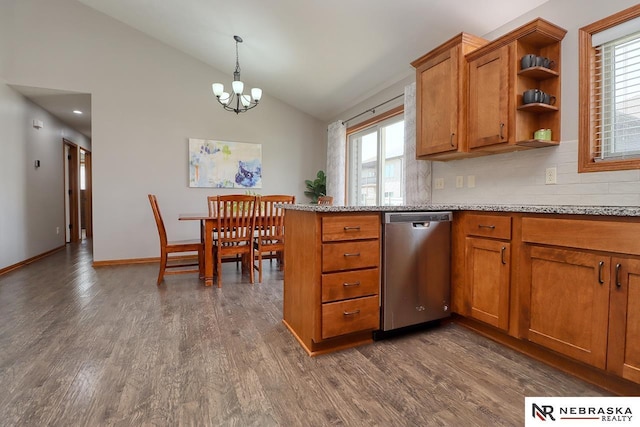 kitchen with dishwasher, brown cabinets, vaulted ceiling, open shelves, and a chandelier