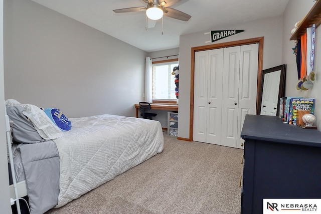 bedroom with carpet floors, a closet, and ceiling fan