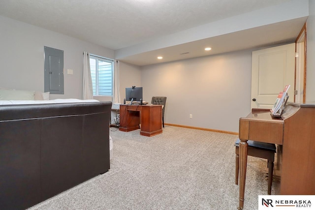 office area featuring light carpet, electric panel, recessed lighting, and baseboards