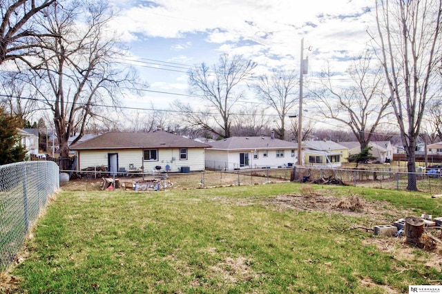 rear view of property with a residential view