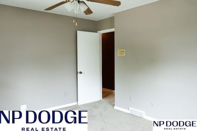 unfurnished bedroom with carpet, baseboards, and ceiling fan