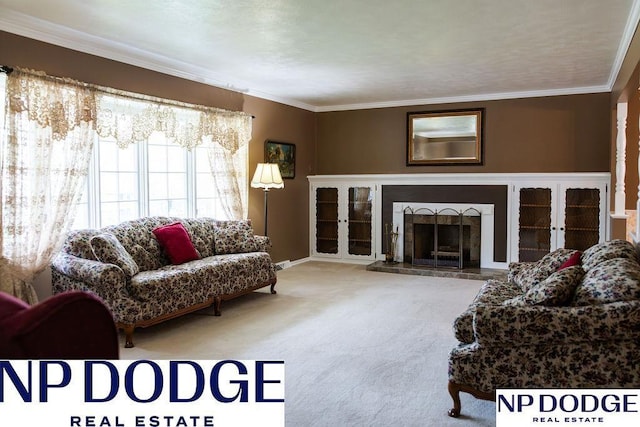 carpeted living room with ornamental molding, baseboards, and a fireplace with raised hearth