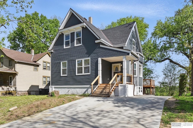 view of front of home with a chimney