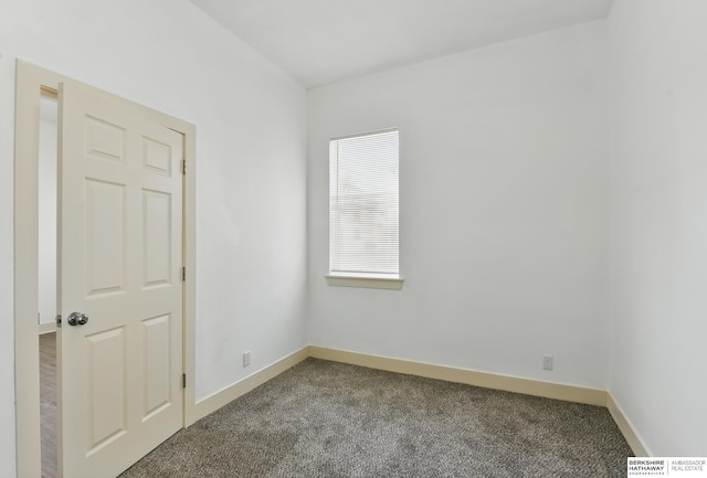 empty room with carpet flooring and baseboards