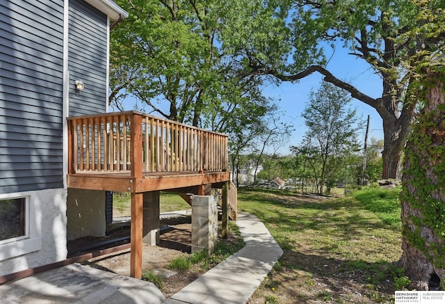 view of home's community featuring a wooden deck