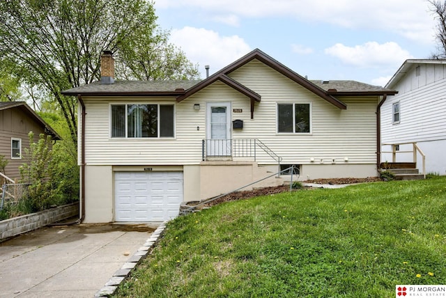 single story home with driveway, a chimney, a front yard, and a garage