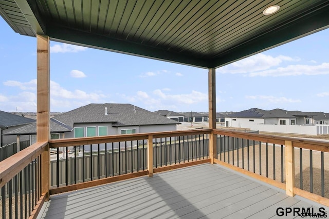 235 N 105th St, Lincoln, NE 68527 - wooden terrace with a residential view and a fenced backyard