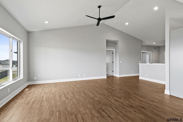 235 N 105th St, Lincoln, NE 68527 - unfurnished living room with a ceiling fan, wood finished floors, baseboards, recessed lighting, and vaulted ceiling