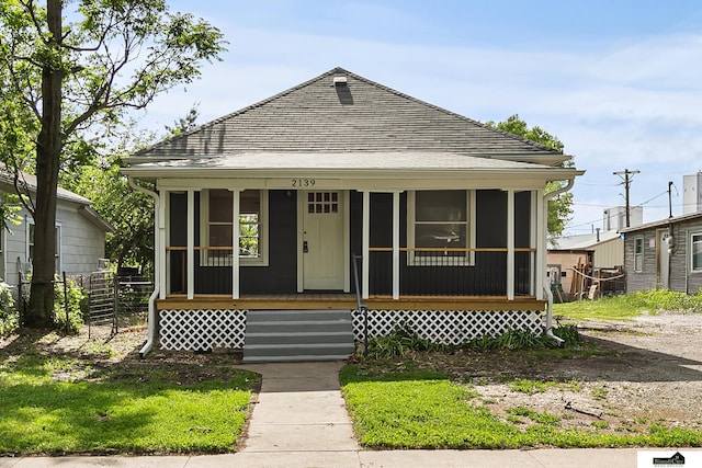 2139 S 8th St, Lincoln, NE 68502 - view of front facade featuring a shingled roof