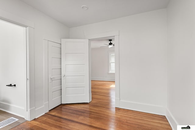2139 S 8th St, Lincoln, NE 68502 - unfurnished bedroom with wood finished floors and baseboards