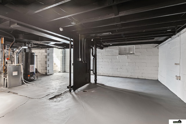 2139 S 8th St, Lincoln, NE 68502 - unfinished below grade area with gas water heater and heating unit