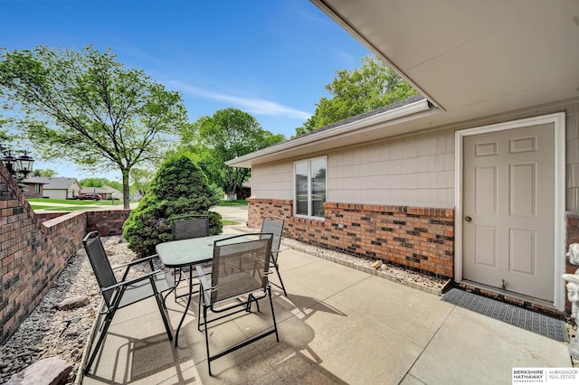 view of patio featuring outdoor dining space
