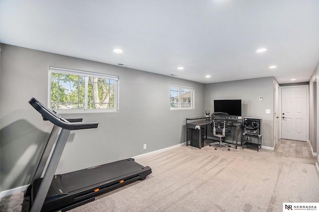 workout room with baseboards, recessed lighting, and carpet floors