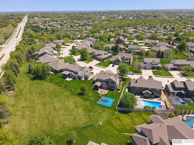 aerial perspective of suburban area with a pool area