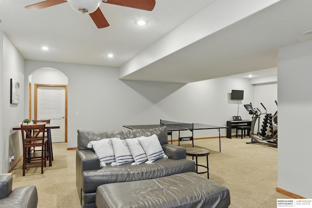living room with light colored carpet, baseboards, recessed lighting, and ceiling fan