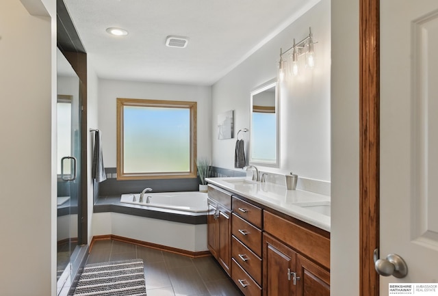 full bathroom featuring double vanity, a bath, tile patterned floors, and a stall shower