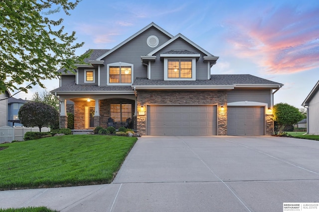 view of front of home with stone siding, concrete driveway, a shingled roof, a porch, and an attached garage