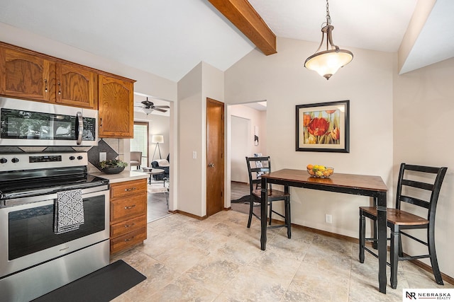 14523 Parker St, Omaha, NE 68154 - kitchen with stainless steel appliances, brown cabinetry, light countertops, pendant lighting, and baseboards