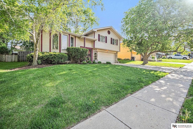 14523 Parker St, Omaha, NE 68154 - split level home with driveway and an attached garage