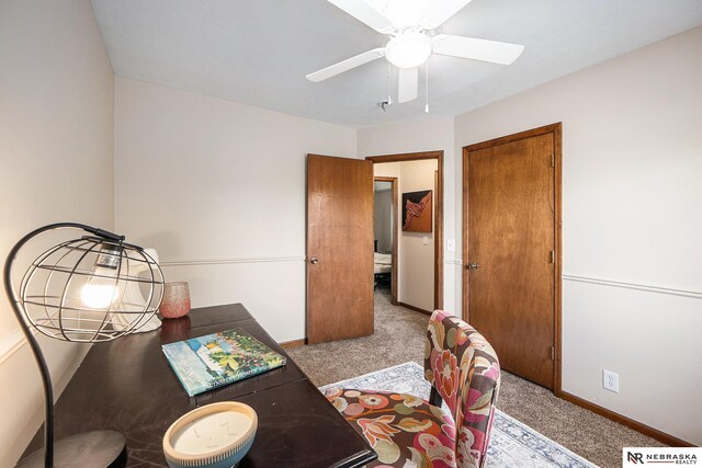 14523 Parker St, Omaha, NE 68154 - carpeted dining space with baseboards and a ceiling fan