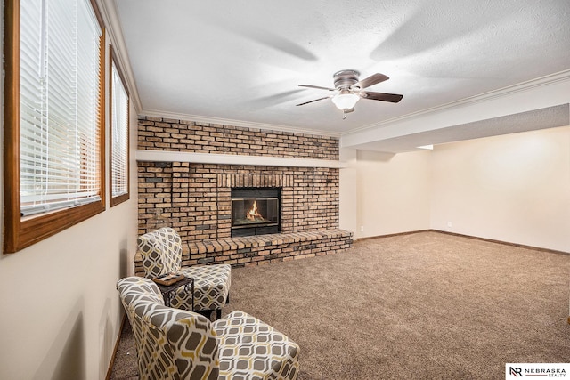 14523 Parker St, Omaha, NE 68154 - carpeted living room with ceiling fan, crown molding, a brick fireplace, and baseboards