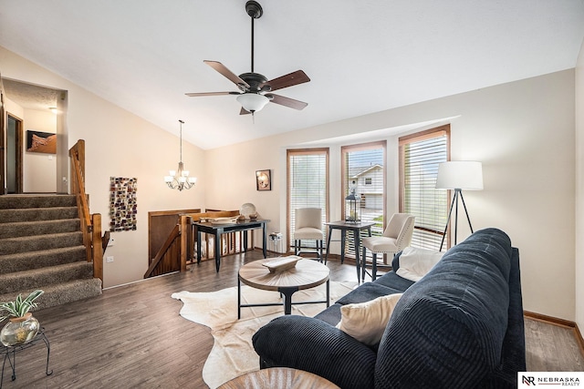 14523 Parker St, Omaha, NE 68154 - living room with vaulted ceiling, light wood-type flooring, ceiling fan, baseboards, and a chandelier