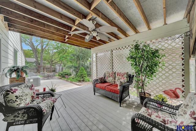 wooden deck with ceiling fan, a fenced backyard, and central AC unit