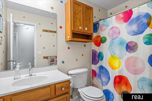 11019 Weber St, Omaha, NE 68142 - bathroom with vanity, toilet, and a shower with shower curtain