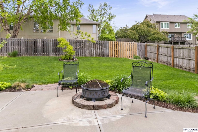 view of patio / terrace featuring an outdoor fire pit