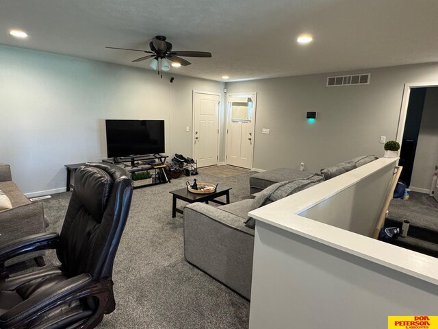 3545 Little Bluestem Rd, Fremont, NE 68025 - carpeted living area featuring recessed lighting, ceiling fan, and baseboards