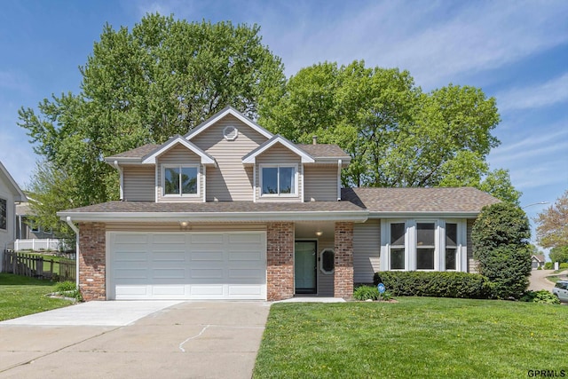 traditional-style house featuring driveway, an attached garage, brick siding, and roof with shingles