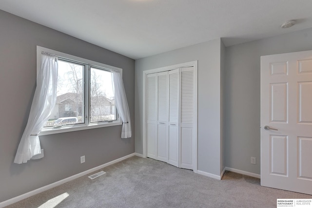 8114 S 167th St, Omaha, NE 68136 - unfurnished bedroom featuring carpet and a closet