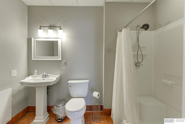 8114 S 167th St, Omaha, NE 68136 - full bath featuring a shower with curtain, tile patterned floors, and a paneled ceiling