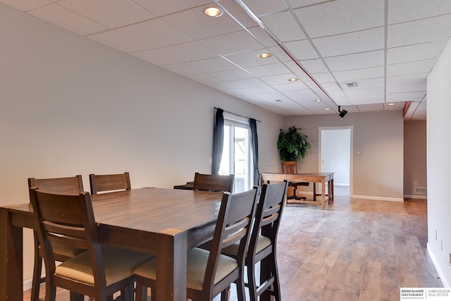8114 S 167th St, Omaha, NE 68136 - dining space featuring a paneled ceiling, light wood finished floors, and recessed lighting