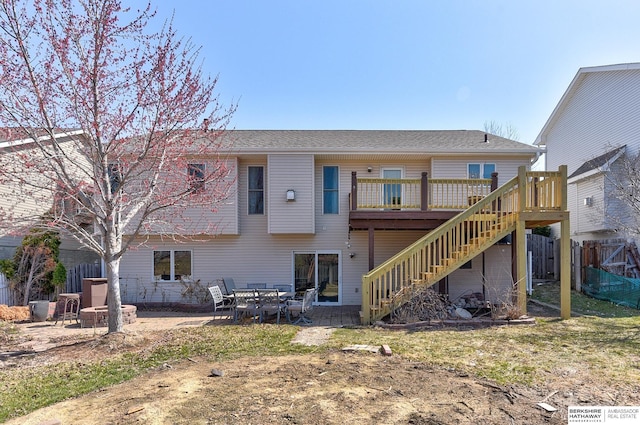 8114 S 167th St, Omaha, NE 68136 - back of property with stairway and a wooden deck