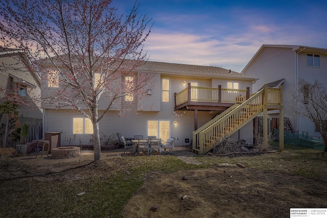 8114 S 167th St, Omaha, NE 68136 - rear view of house featuring a fire pit, stairs, and a deck