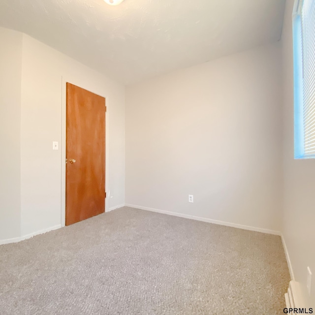101 E 28th Ave, Bellevue, NE 68005 - empty room with carpet floors and baseboards