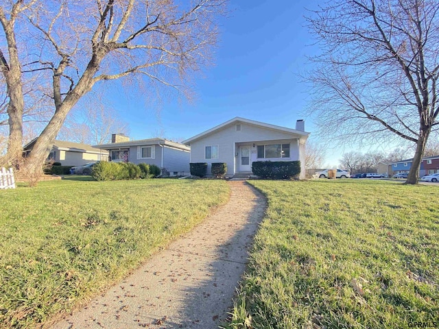 101 E 28th Ave, Bellevue, NE 68005 - view of front of property with a chimney and a front yard