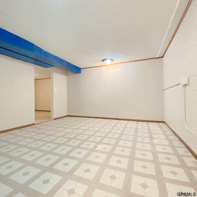 101 E 28th Ave, Bellevue, NE 68005 - spare room with a textured ceiling and baseboards