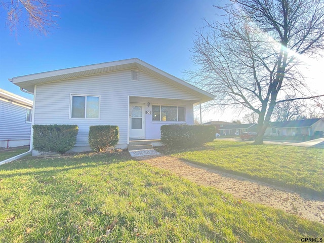 101 E 28th Ave, Bellevue, NE 68005 - view of front of house with a front yard and entry steps
