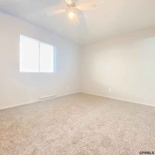 101 E 28th Ave, Bellevue, NE 68005 - empty room with carpet floors, baseboards, and ceiling fan