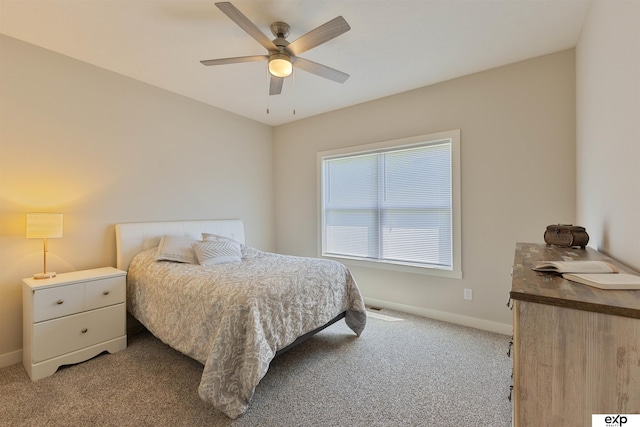 513 13th Ave, Plattsmouth, NE 68048 - bedroom with light carpet, baseboards, and ceiling fan